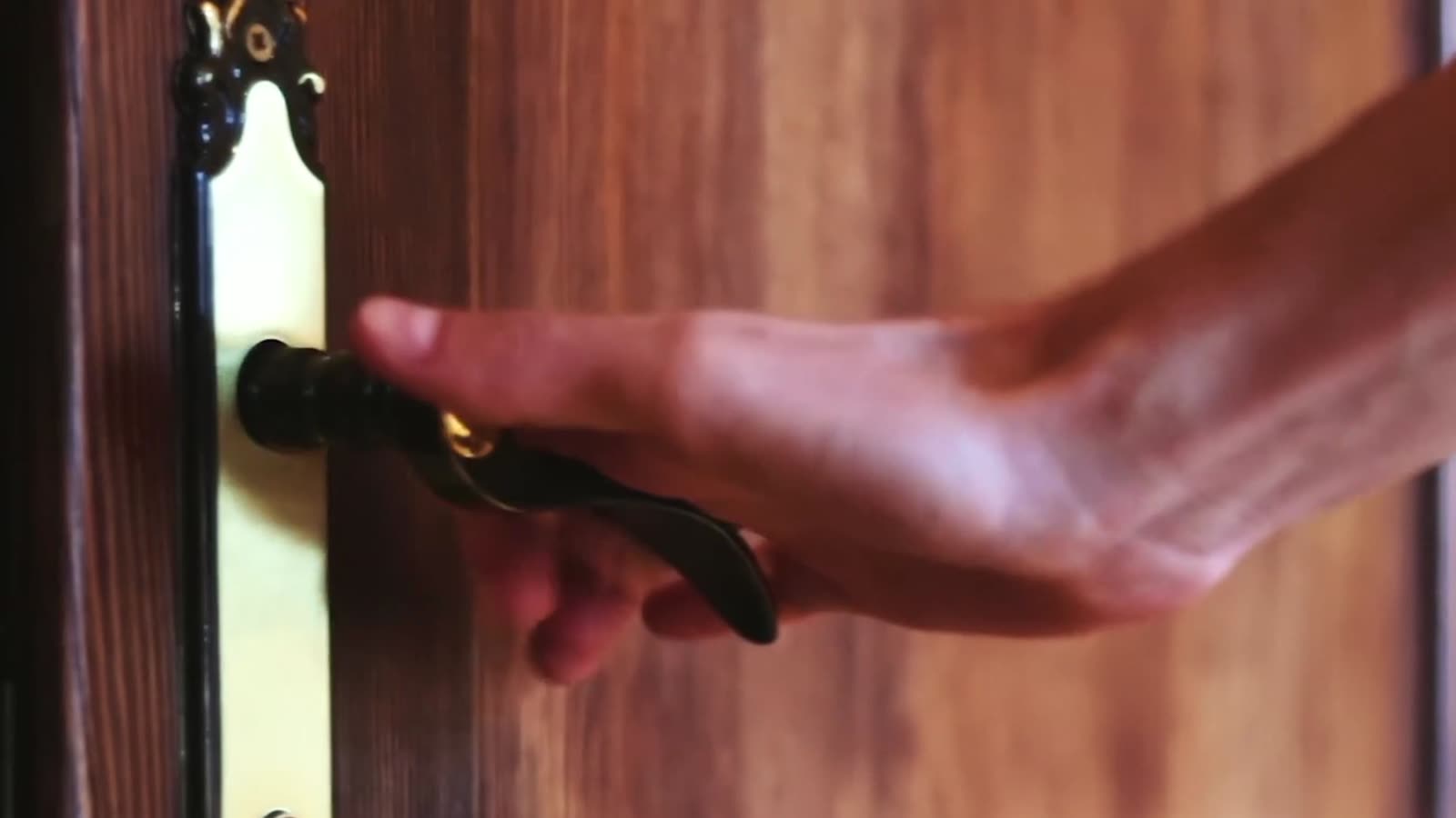 Red Door Realty brand film, a front door opening and clients at home